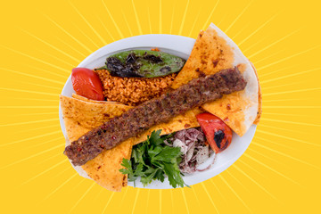 Turkish Adana Kebab with Vegetables on the Plate