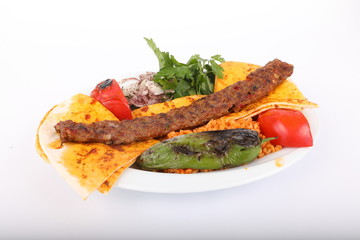 Turkish Adana Kebab with Vegetables on the Plate