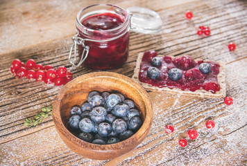 Pastry appetizers jam spread blueberries and cranberries