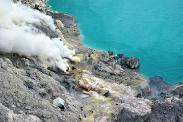 Kawah Ijen volcano and sulfur lake is composite volcanoes in the Banyuwangi Regency of East Java, Indonesia, Kawah ijen have Blue fire crater and Sulfur mining.