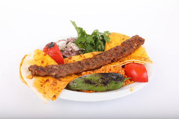 Turkish Adana Kebab with Vegetables on the Plate