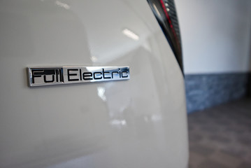 Full electric badge for electrical vehicle