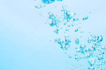 The bubbles under the blue water