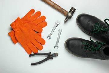 Set of professional work tools on a white background. Top view