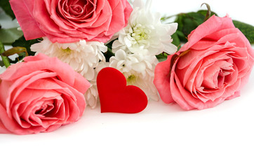 pink roses and red heart isolated on white background. Close-up.