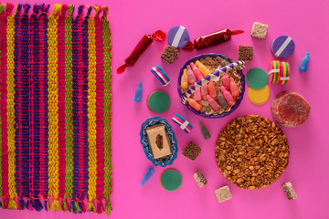 Typical Mexican Candy, Variety of Candies from Mexico and woven tablecloth.