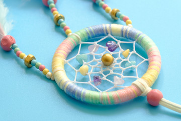 Close up of dream catchers on blue background