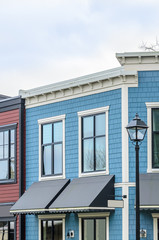 The top of the house  or apartment with nice window.