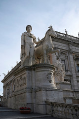 Fototapeta na wymiar Rome, Italy - February 03, 2020 : Statue of the Capitoline Hill cordonata