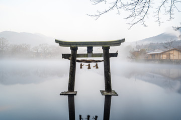pagoda at the foggy lake