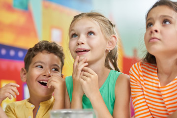 Happy smiling kids. Joyful children having fun in entertainment center. Childrens positive emotions.