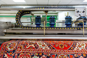Automatic washing and cleaning of carpets. Industrial line for washing carpets