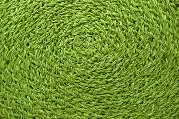 Beautiful pattern and texture of vibrant green colored woven sedge place mat