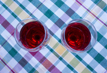 top view of two glasses of Sicilian red wine on the table