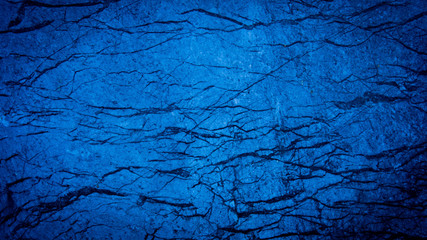 Natural blue slate texture in high resolution for background and design work, black stone wall