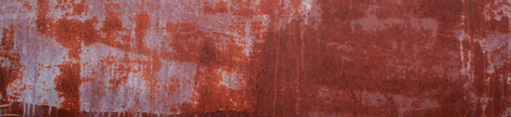 Rust and oxidized metal brown texture. Rusted orange grunge metal background. Old and dirty iron building wall