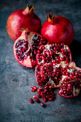 Ripe pomegranate. Pomegranate on black background. Dessert,food.