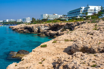 Fototapeta premium Cyprus. Resort of Ayia Napa. Resorts overlooking the Mediterranean Sea. Hotels on the shores of Cyprus. Resort landscape. Nature. Ayia Napa Resort Cruise. Tour to Cyprus. Tropical island