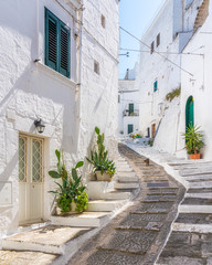 Scenic sight in Ostuni on a sunny summer day, Apulia (Puglia), southern Italy. 