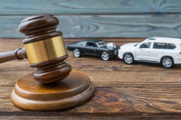 Judge gavel and two cars colliding, traffic accident, insurance, fault. Court law - obrazy, fototapety, plakaty