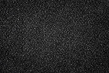 Fototapeta na wymiar Black fabric texture. Textile background with vignette