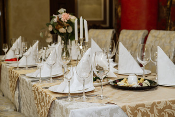 Table setting. Festive table. Table with appliances