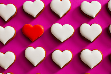 Valentines day composition of white heart shaped cookies