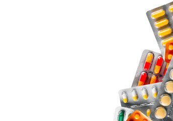 Ð¡olorful pills on white background. Free space for text.