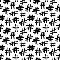 Hashtag grunge vector seamless pattern. Hand drawn ink illustration. Background with social media signs and symbols.