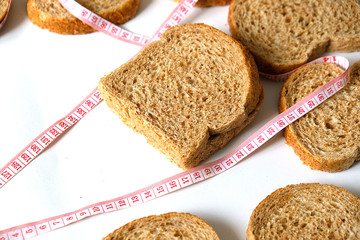 Sliced wholemeal bread on a white background,