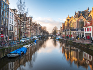 Fototapeta premium Amsterdam City Canal view with cloudy sky background