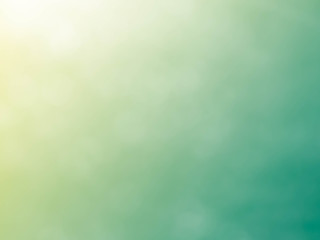 green,Golden background with soft bokeh lights.