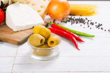 mediterranean food ingredients on white wood table