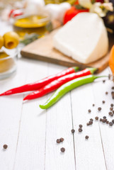 mediterranean food ingredients on white wood table