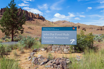 The sign welcoming visitors to the Clarno Unit of the John Day Fossil Beds National Monument,...
