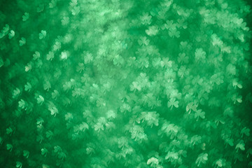 Clover shaped bokeh. St.Patrick 's Day. Blurred abstract background. Green shamrock