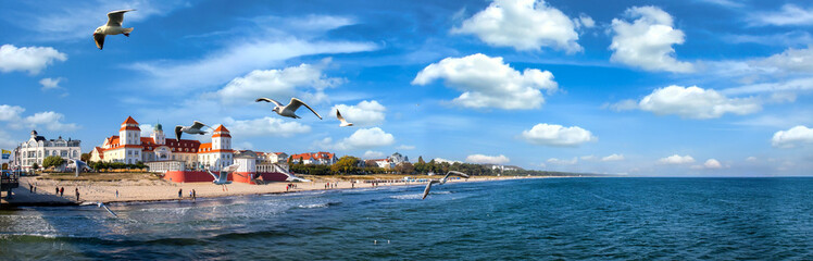 Beach promenade of Rügen-Binz on a sunny day with spa house in the background