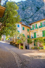 Fototapeta premium Picturesque small town street view in Limone, Lake Garda Italy.