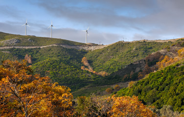 Wind farms in the mountains, autumn landscape
