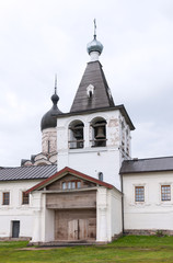 Fototapeta na wymiar Bell tower of Ferapontov monastery in summer, founded by Saint Ferapont in 1398, Ferapontovo villadge, Vologda region, Russia