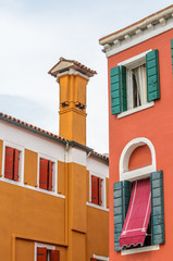 Beautiful window decorated with flowers in Italy