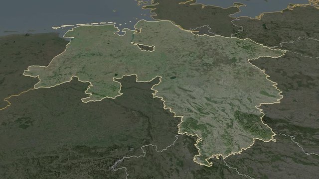 Niedersachsen, state with its capital, zoomed and extruded on the satellite map of Germany in the conformal Stereographic projection. Animation 3D
