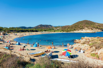 People at Chia beach and Mediterranian Sea