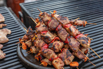 Pork sausage and hot dogs on the grill
