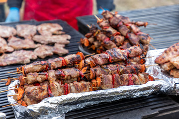 Pork sausage and hot dogs on the grill