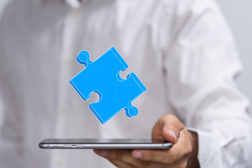puzzle hand solution concept business.