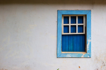 Blue Old Window on White Wall