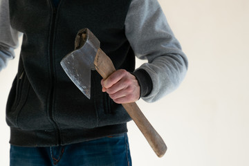 crazy maniac with an ax in his hand on a white background