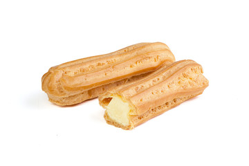 Eclairs isolated on white background. Delicious french dessert. Sweet dessert.