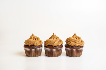 Three chocolate cupcakes